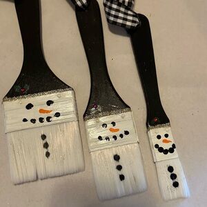 Repurposed paint brushes.